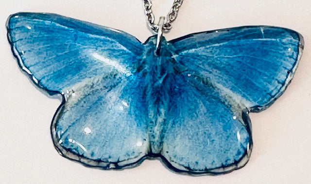 Adonis Blue butterfly Resin translucent butterfly necklace.