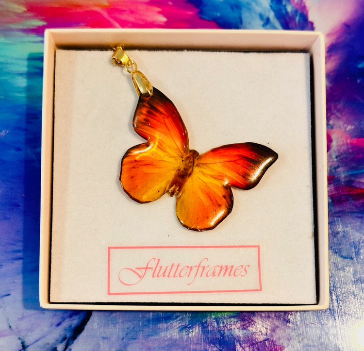 orange and yellow resin butterfly necklace by Flutterframes