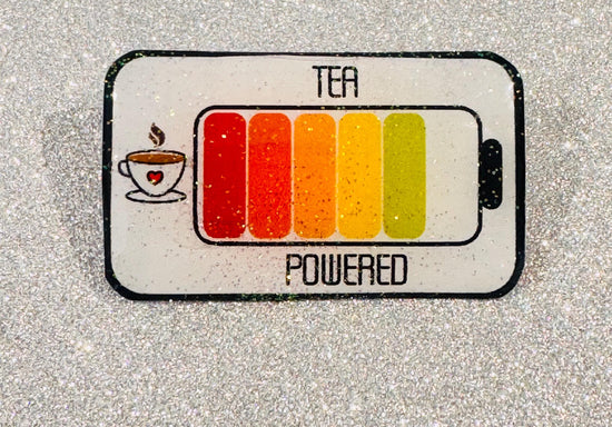 Tea powered enamel pin