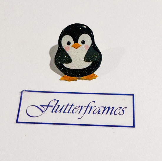 Penguin enamel pin from recycled tin cans