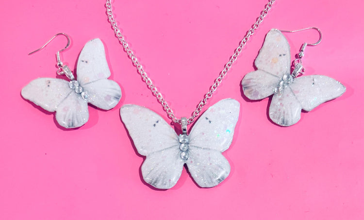 Beautiful white butterfly earrings and pendant set. Sparkly white butterfly jewellery Very unique and chic.