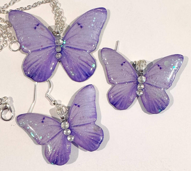 Beautiful lilac butterfly earrings and pendant set. Sparkly purple butterfly jewellery