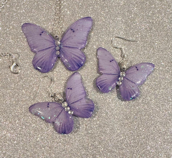  lilac butterfly earrings and pendant set. Sparkly purple butterfly jewellery. Butterflies