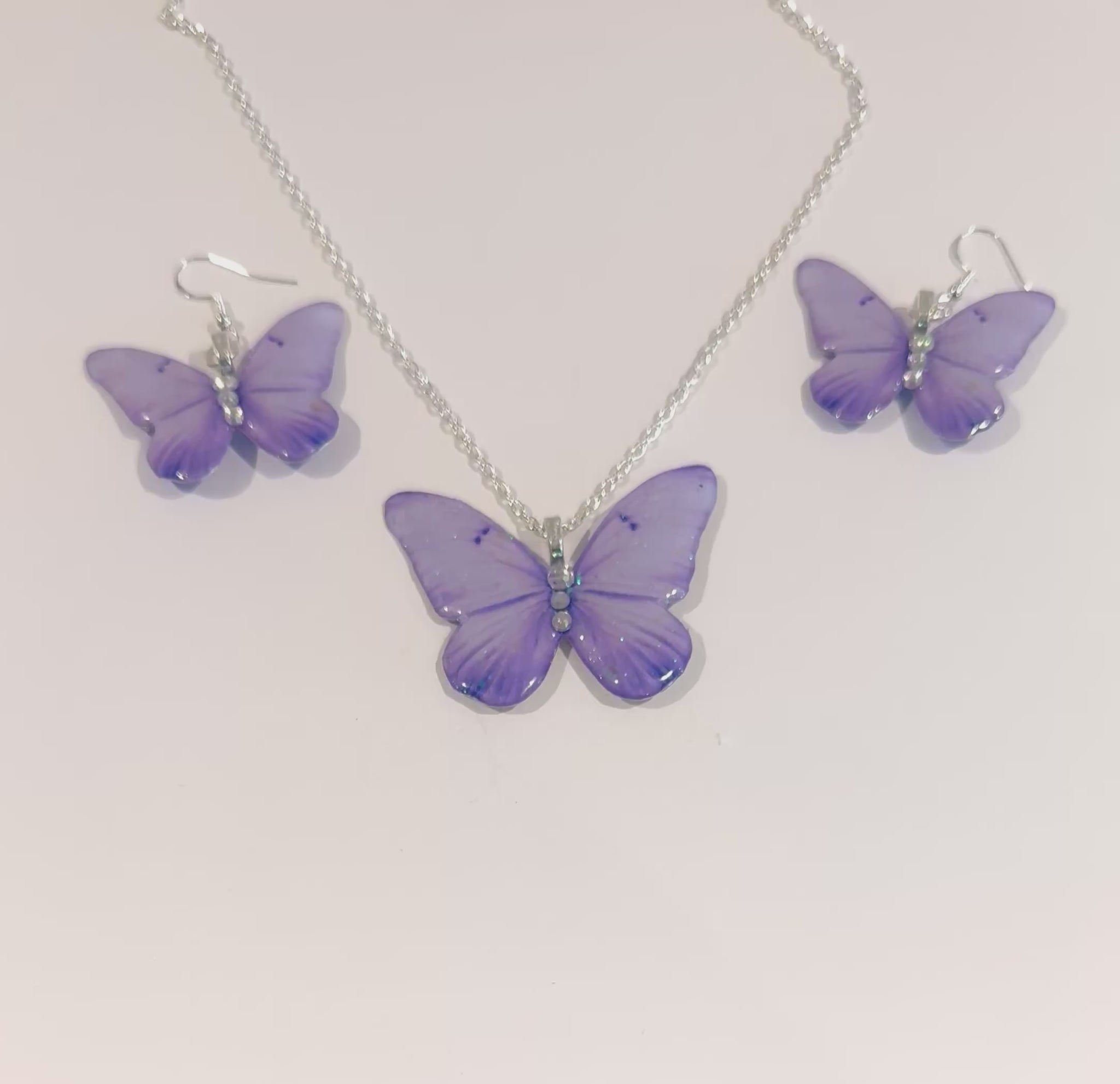 Beautiful lilac Sparkly butterfly earrings and pendant set